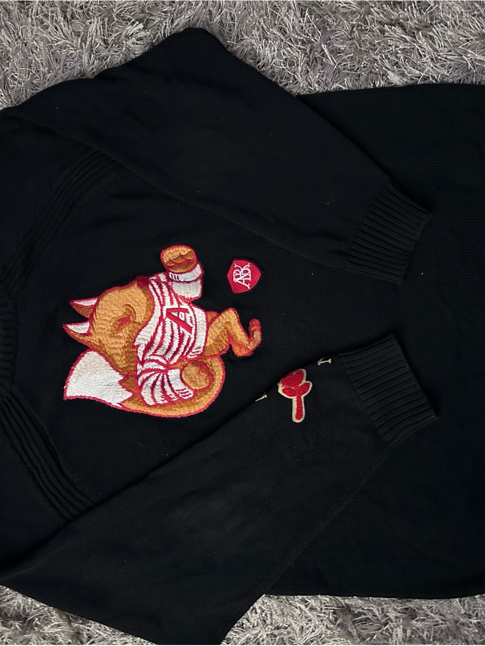 Akoo Black Crewneck Sweater with Embroidered Fox Patch